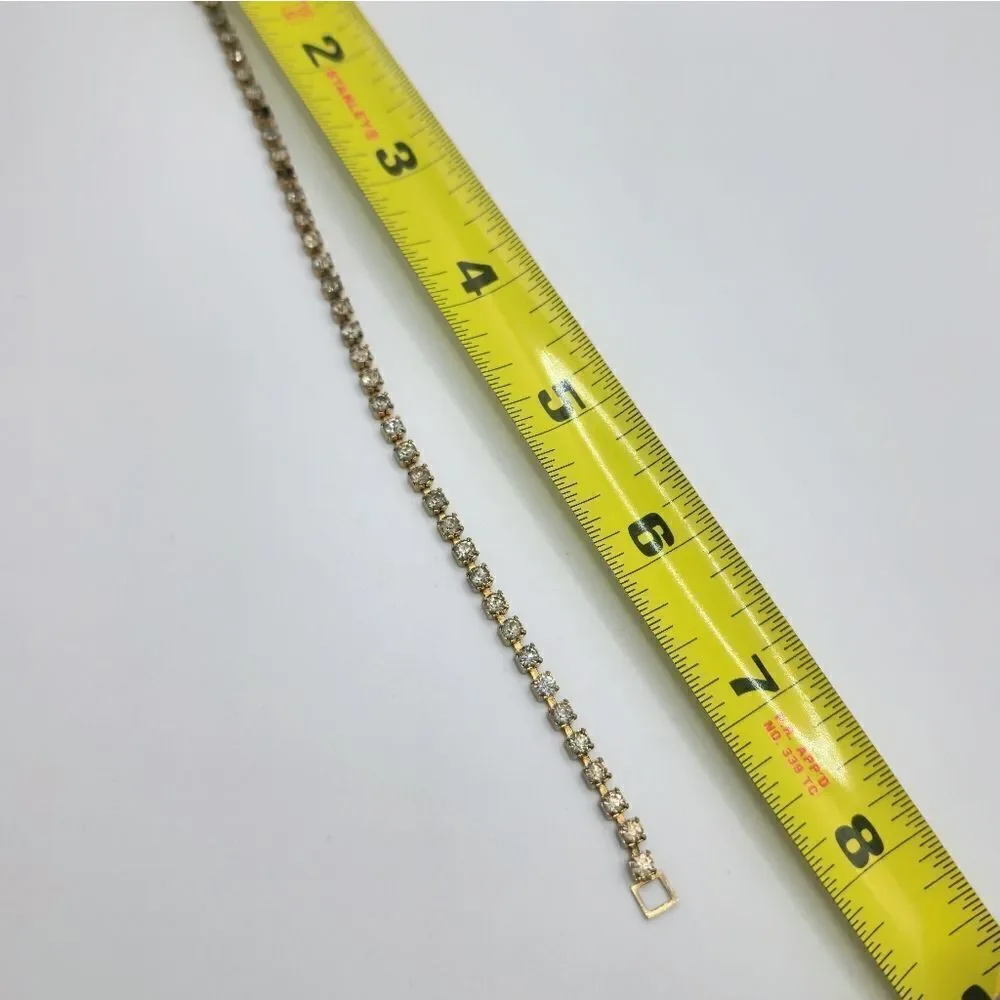 Vintage gold rhinestone prong set tennis bracelet